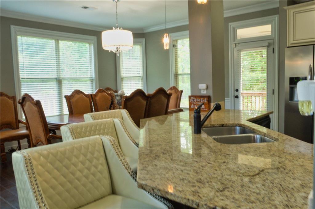 5639 Sunbury Loop Evans, GA 30809 - Photo 9 of 22 a living room with furniture and a large mirror
