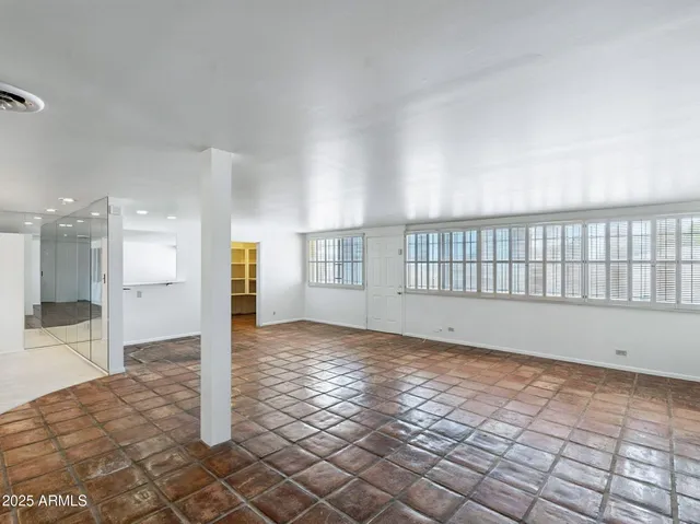 a bathroom with a shower and a bathtub