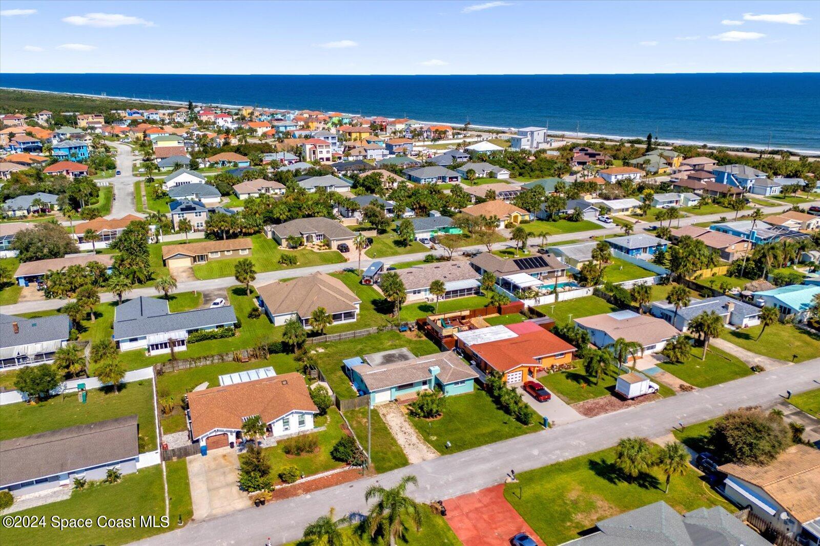 23 Dolphin Ormond Beach Ormond Beach, FL 32176 - Photo 1 of 1 an aerial view of residential houses with outdoor space