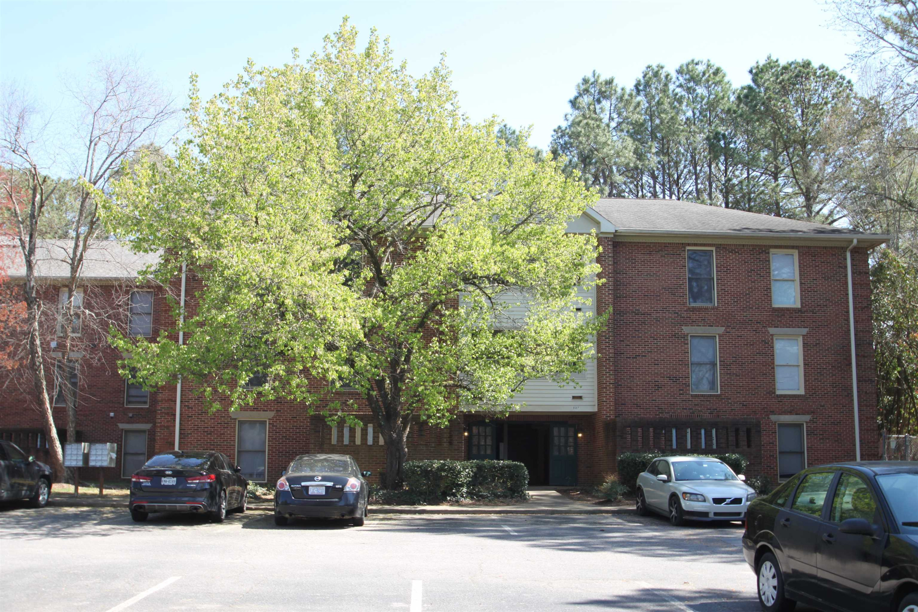 3537 Ivy Commons Drive, Unit 202 Raleigh, NC 27606 - Photo 2 of 51 Brick exterior