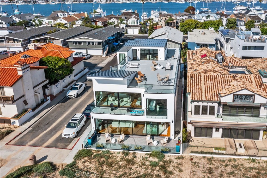 an aerial view of a house with a swimming pool