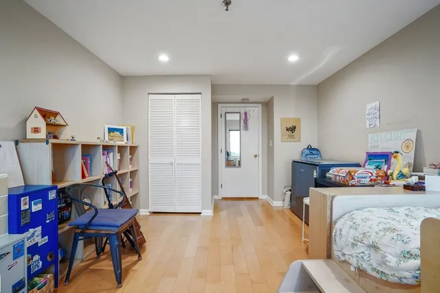a room with furniture and a wooden floor