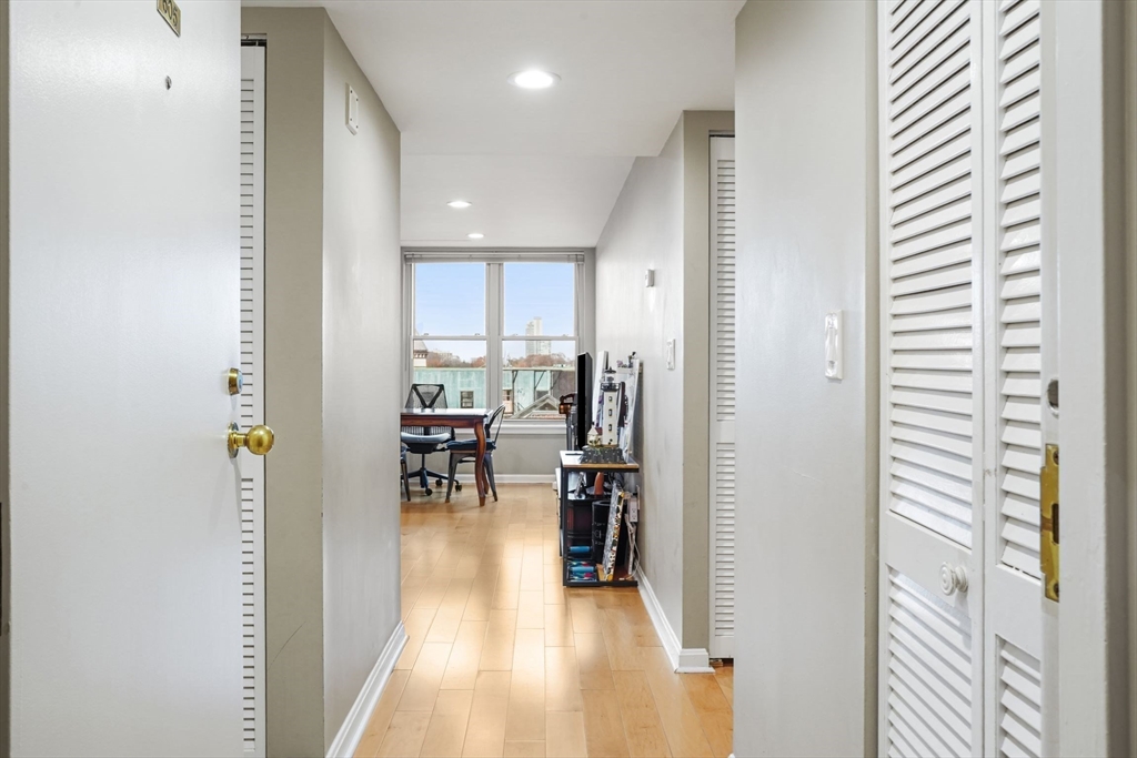 20 Webster Street, Unit 605 Brookline, MA 02446 - Photo 30 of 40 a view of a kitchen from the hallway