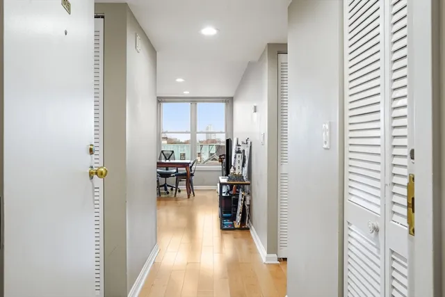 a view of a kitchen from the hallway