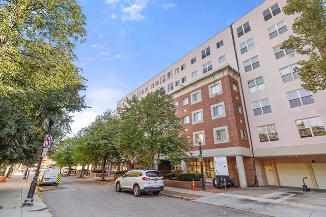 a car parked in front of a building
