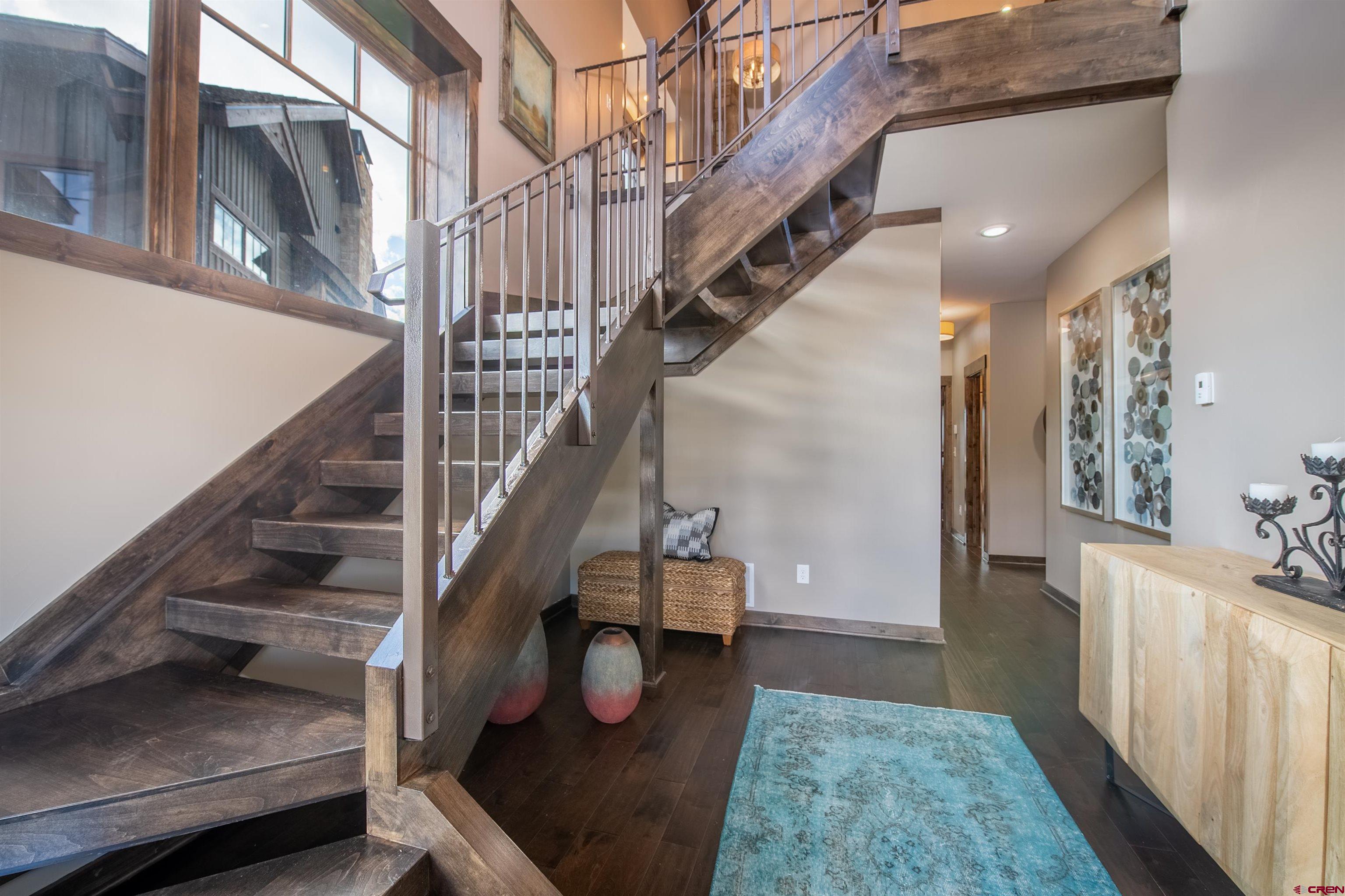 14 Ace Court Crested Butte, CO 81224 - Photo 18 of 24 a view of entryway and hall with wooden floor