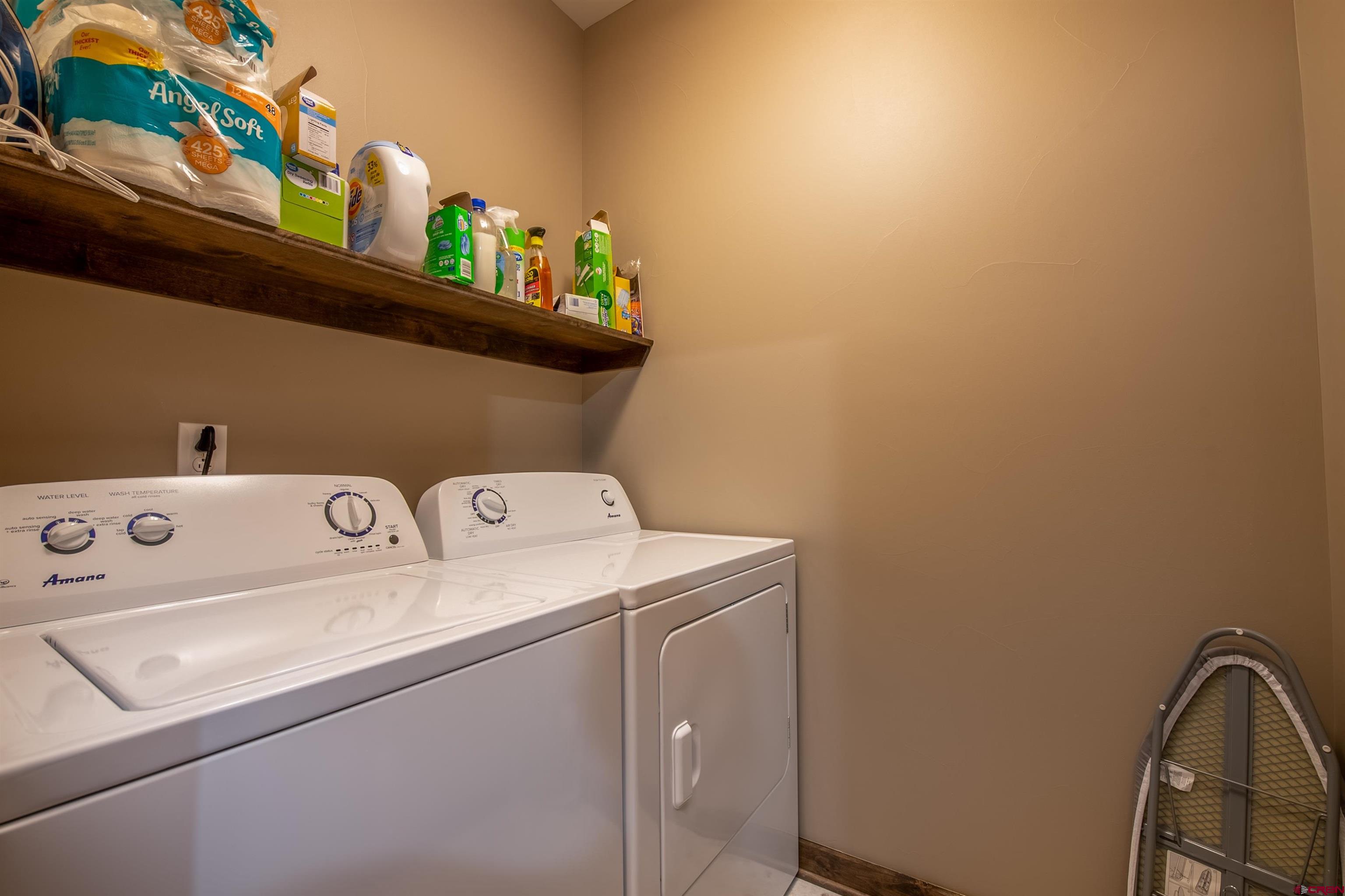 14 Ace Court Crested Butte, CO 81224 - Photo 19 of 24 a utility room with dryer and washer