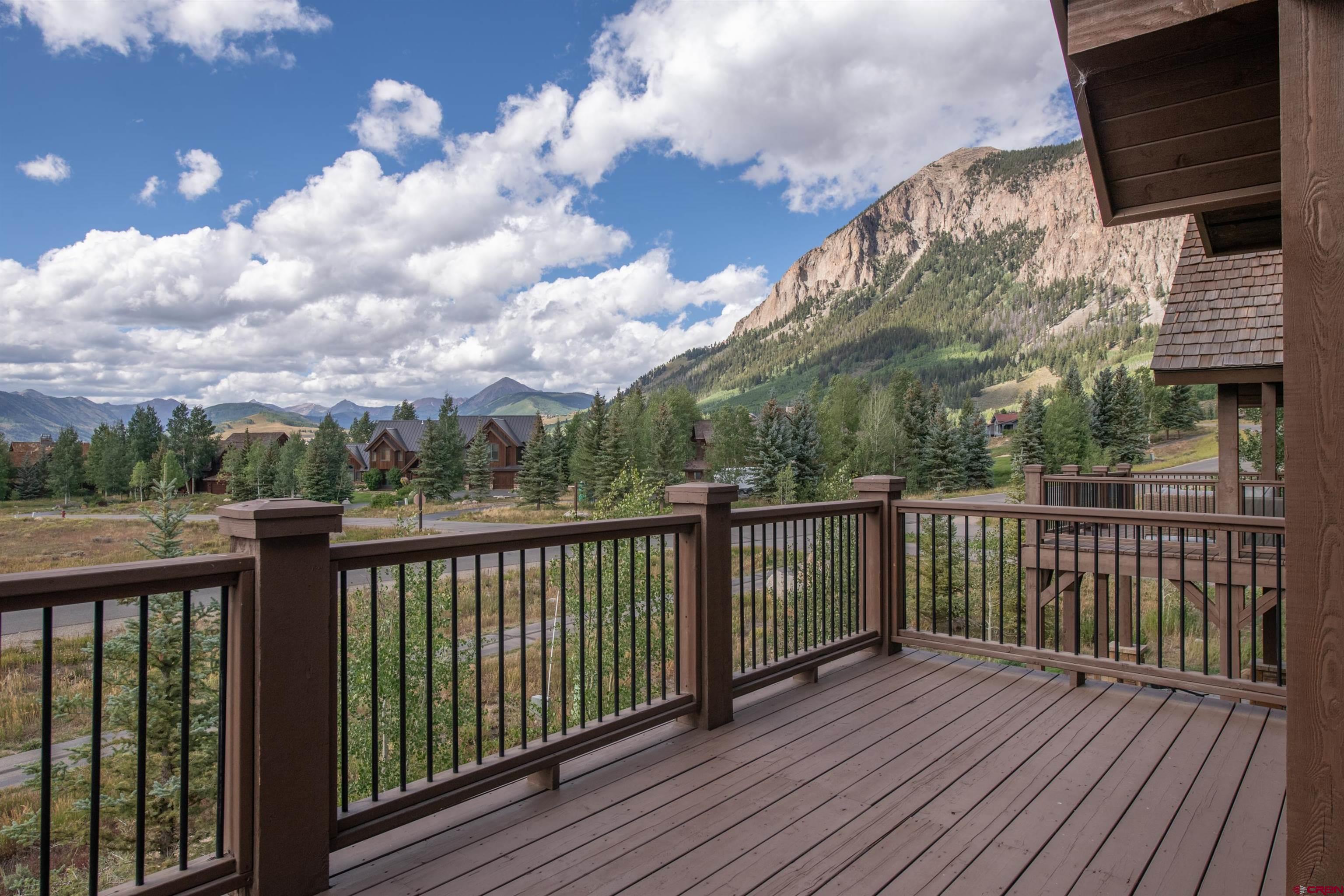 14 Ace Court Crested Butte, CO 81224 - Photo 21 of 24 a view of a balcony with wooden floor