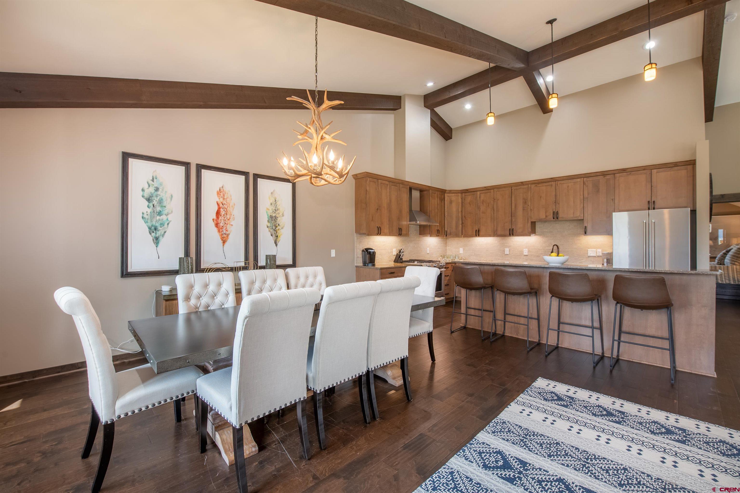 14 Ace Court Crested Butte, CO 81224 - Photo 6 of 24 a view of a dining room with furniture