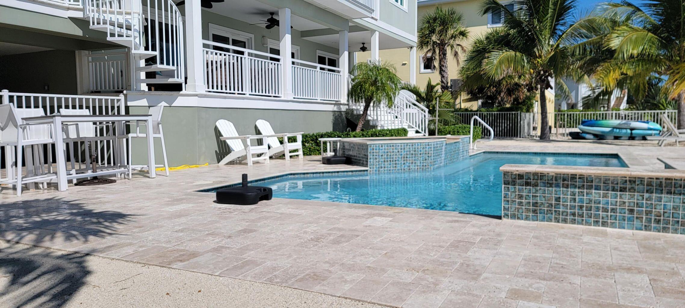 101 Windy Point Circle Marathon, FL 33050 - Photo 15 of 66 a view of outdoor space with deck and kitchen