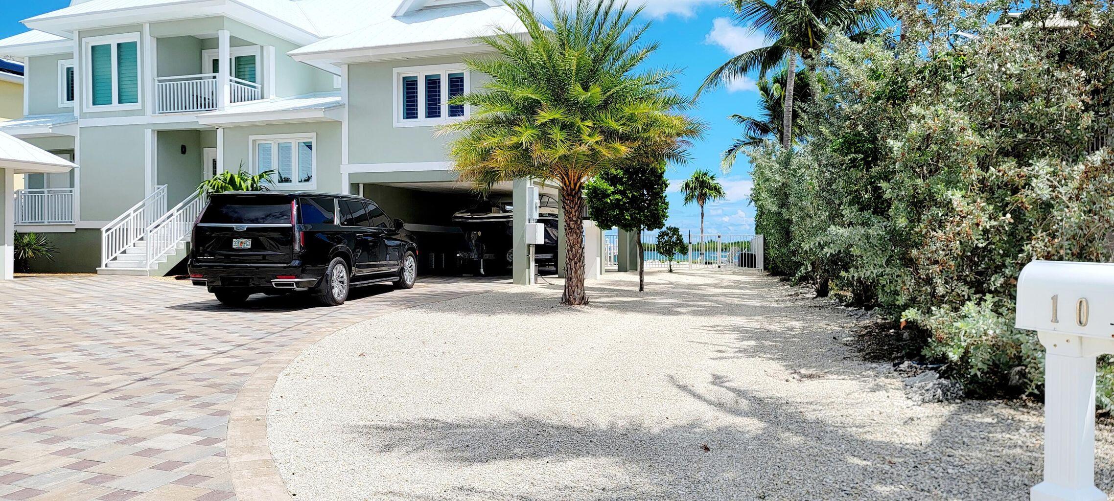 101 Windy Point Circle Marathon, FL 33050 - Photo 16 of 66 a car parked in front of a house