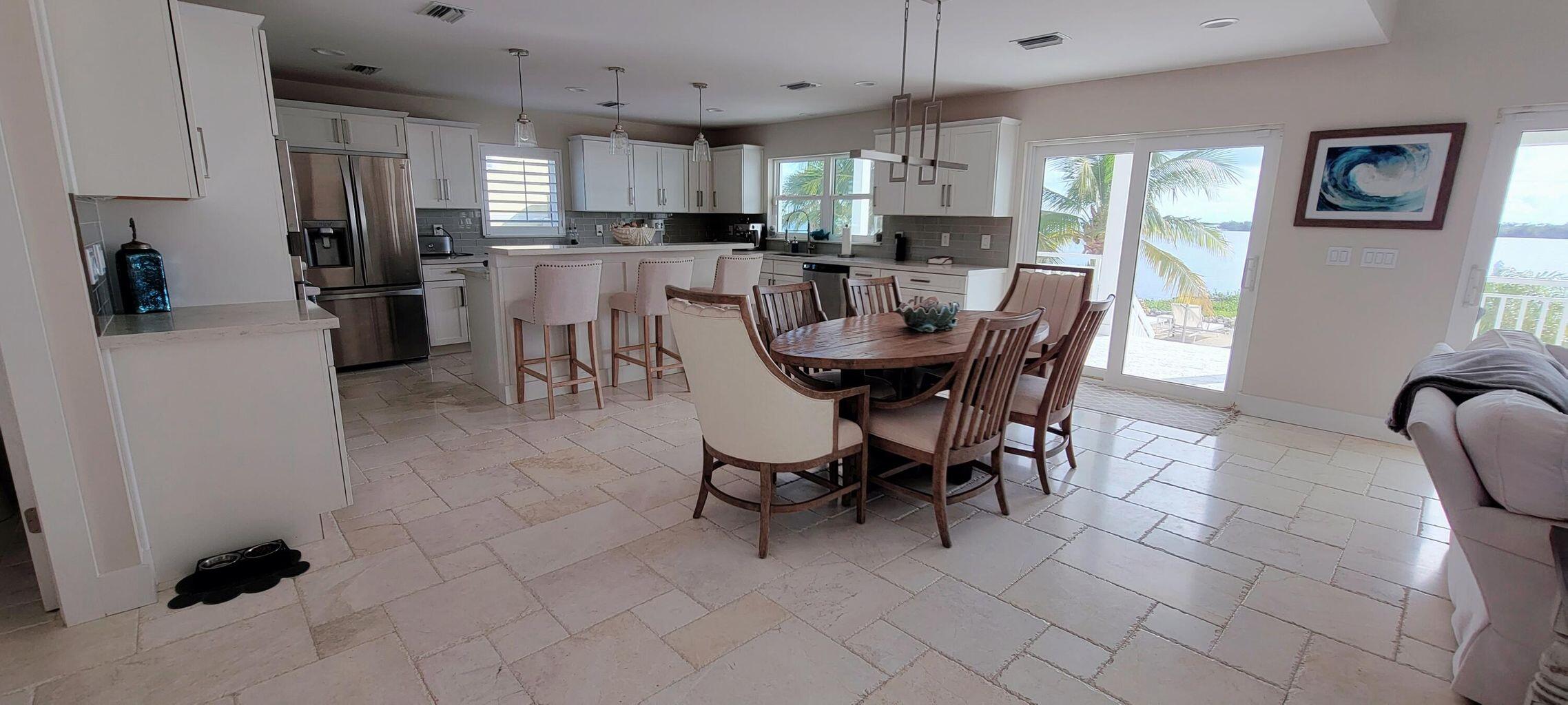101 Windy Point Circle Marathon, FL 33050 - Photo 23 of 66 a view of a dining room with furniture