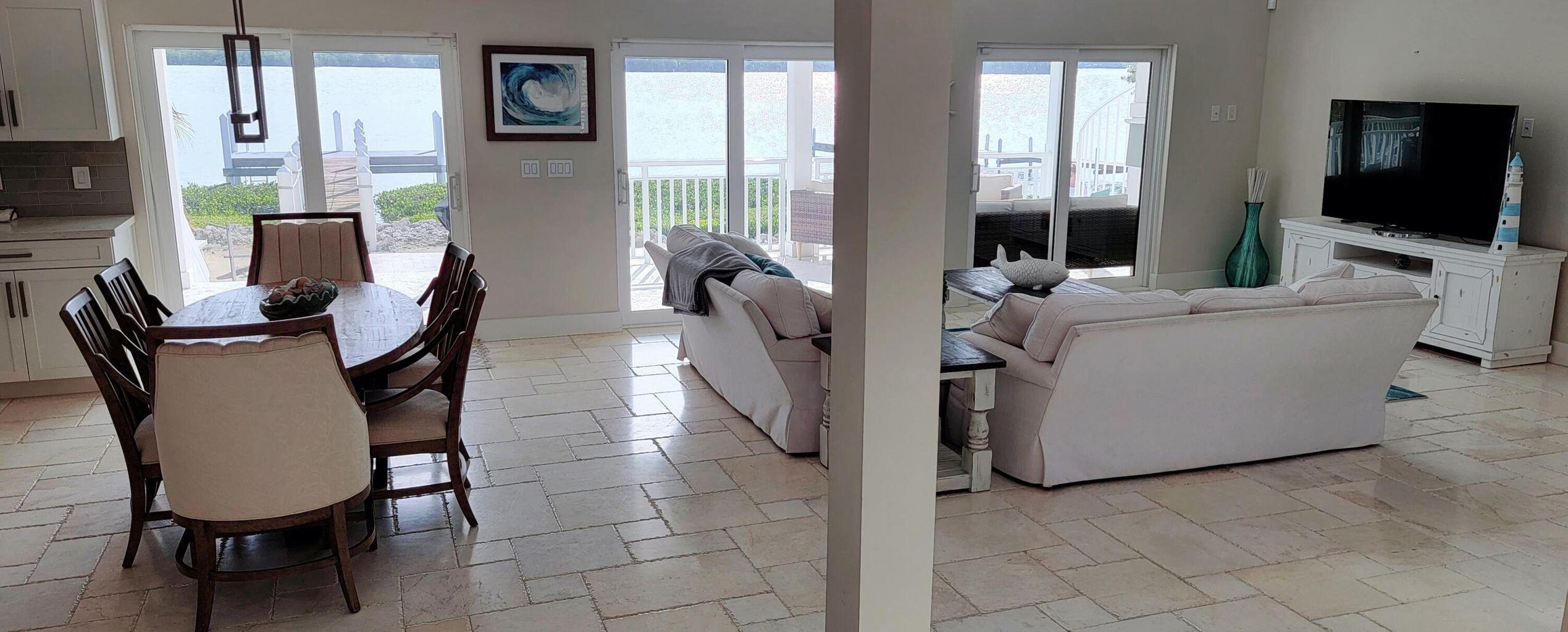 101 Windy Point Circle Marathon, FL 33050 - Photo 29 of 66 a living room with furniture and a flat screen tv