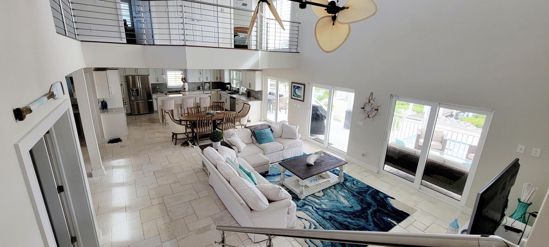 101 Windy Point Circle Marathon, FL 33050 - Photo 31 of 66 a living room with furniture and a flat screen tv