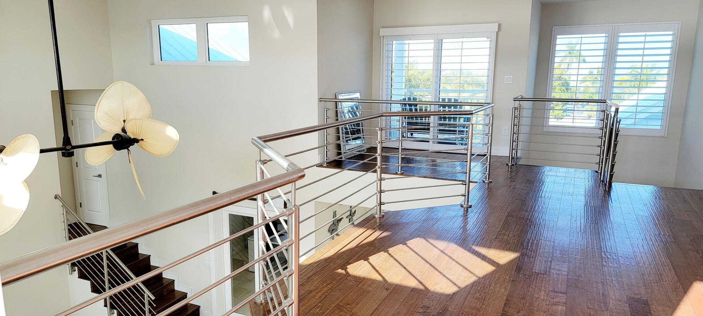 101 Windy Point Circle Marathon, FL 33050 - Photo 41 of 66 a view of entryway and hall with wooden floor