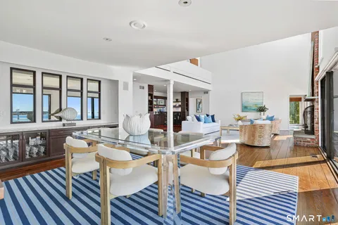 a room with lots of wooden cabinets and glass door