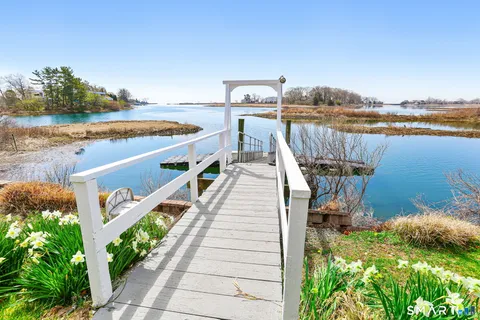 a view of a lake with a outdoor space