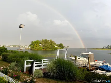 a view of a lake with a building in the background