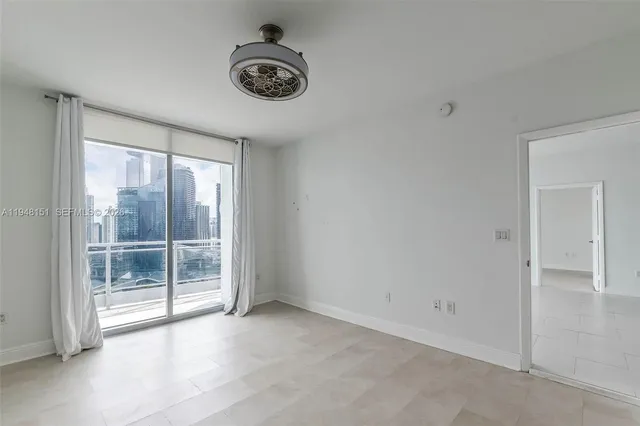 a bathroom with double sink and mirror
