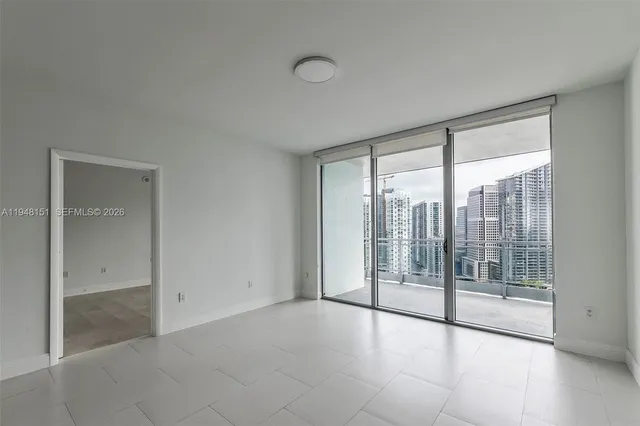 a view of balcony with yard