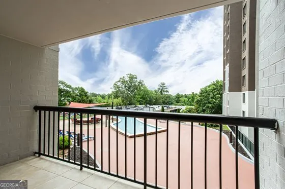 a view of living room and kitchen with furniture