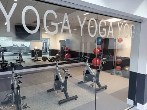 a view of an empty room with storage