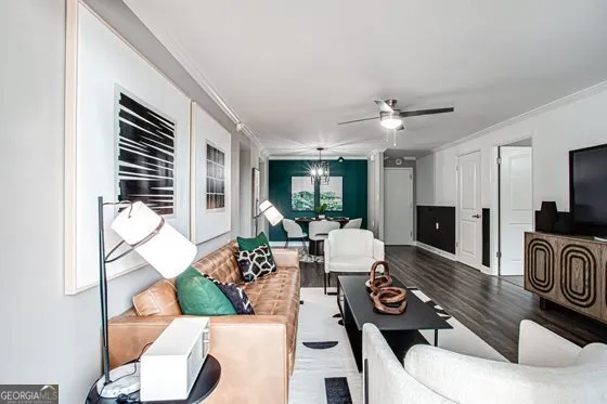 a living room with furniture fireplace and a flat screen tv