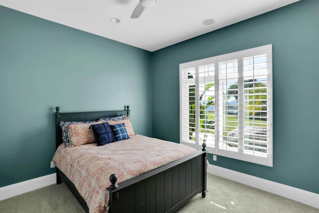 2801 Via Asoleado Alpine, CA 91901 - Photo 30 of 74 a bedroom with a bed and a window