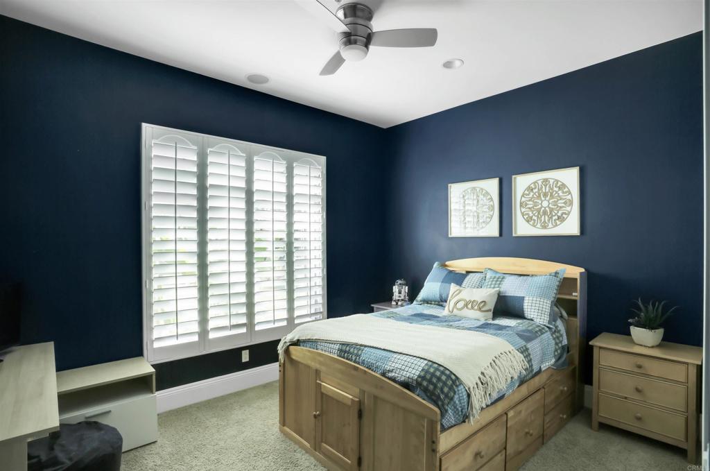 2801 Via Asoleado Alpine, CA 91901 - Photo 32 of 74 a bedroom with a bed and a window