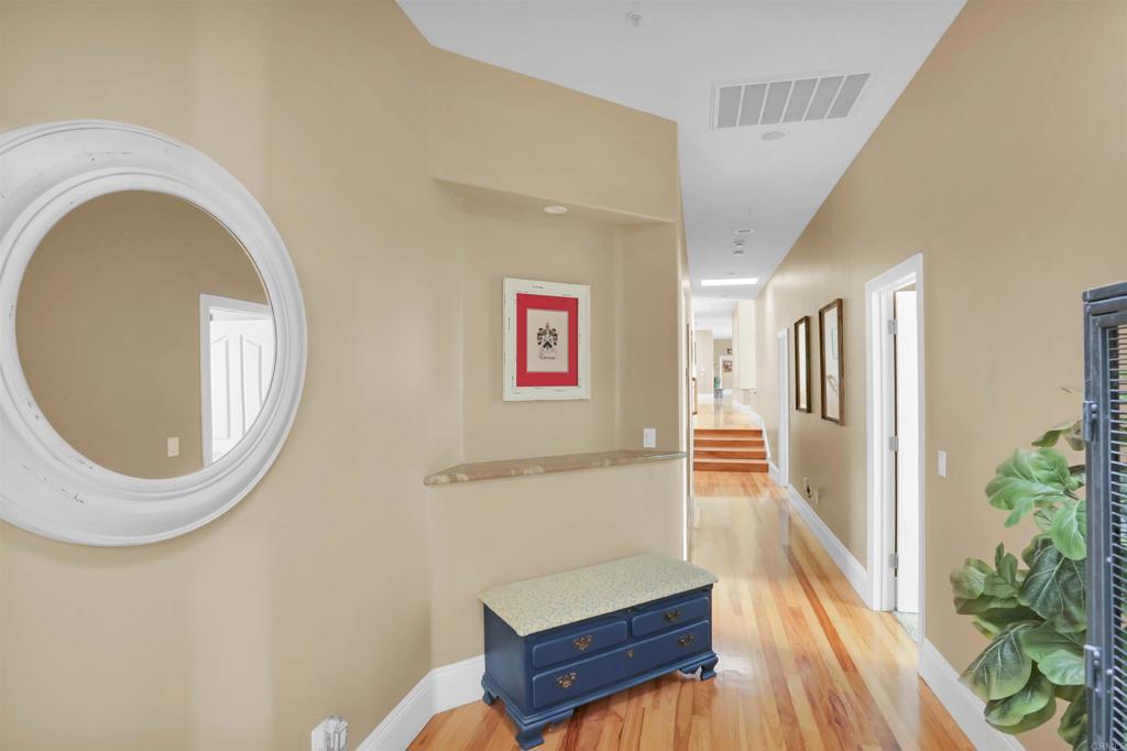 2801 Via Asoleado Alpine, CA 91901 - Photo 33 of 74 a living room with furniture and a mirror