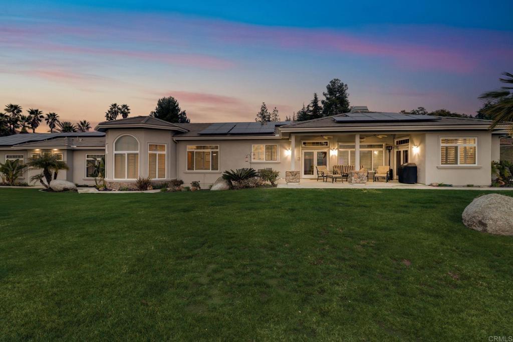 2801 Via Asoleado Alpine, CA 91901 - Photo 55 of 74 a front view of a house with a garden and yard