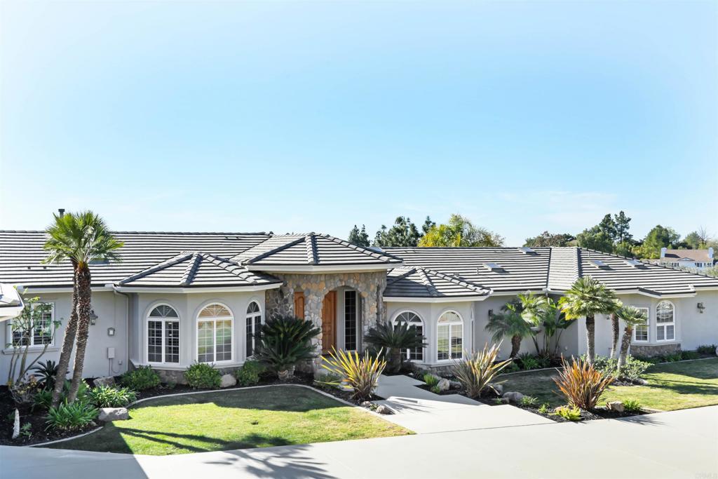 2801 Via Asoleado Alpine, CA 91901 - Photo 63 of 74 a view of a big house with a big yard plants and large tree