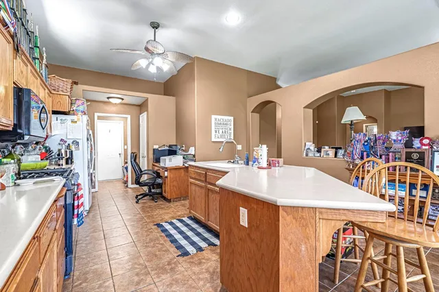 a very nice looking dining room with a large kitchen island