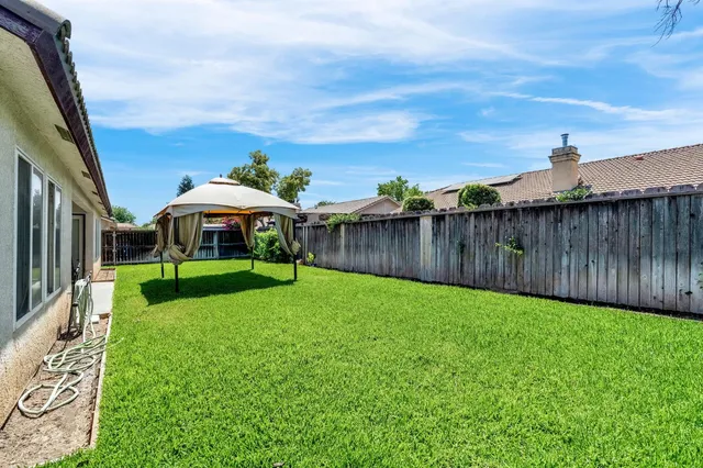a view of a garden with a slide