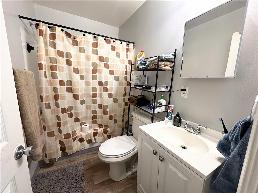 422 Mill Street, Unit D Coraopolis, PA 15108 - Photo 3 of 6 a bathroom with a sink toilet and shower