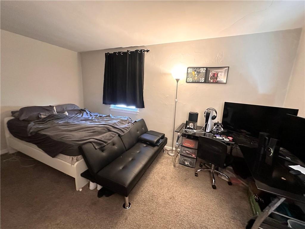 422 Mill Street, Unit D Coraopolis, PA 15108 - Photo 5 of 6 a bedroom with a bed and a desk