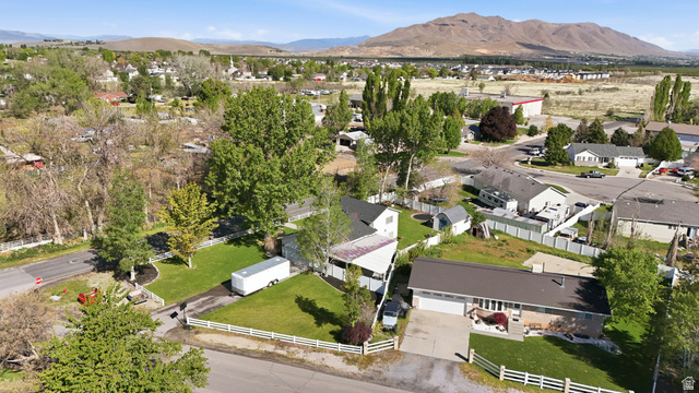 415 East 400 North Santaquin, UT 84655 - Photo 34 of 39 Expansive aerial perspective showcasing a residential property with a mountain backdrop