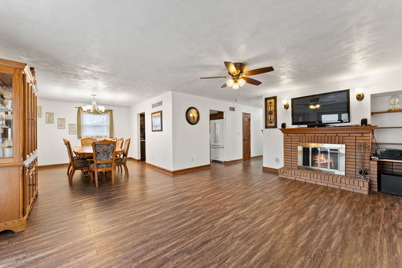 110 Andrea Court Cleveland, IL 61241 - Photo 6 of 23 a living room with furniture and a fireplace
