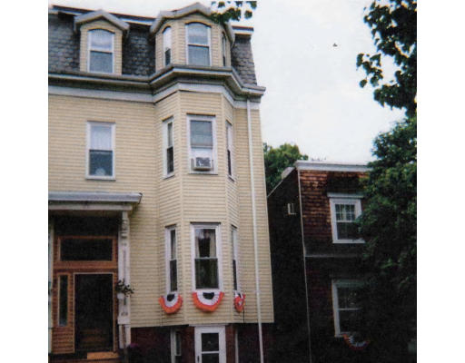 404 East 7th Street Boston, MA 02127 - Photo 1 of 1 a front view of a building with many windows