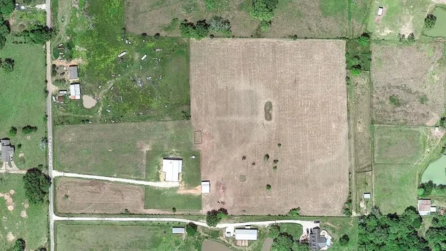 a view of a lake with a big yard
