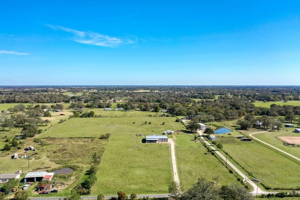 22273 Chapman Road Hempstead, TX 77445 - Photo 28 of 49 an aerial view of residential houses with outdoor space