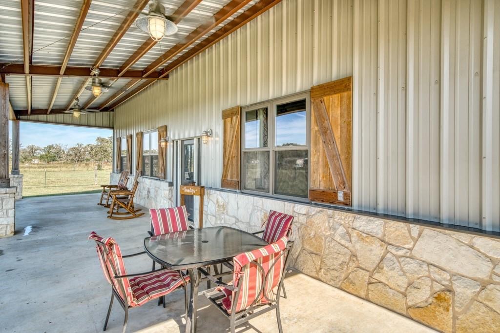 22273 Chapman Road Hempstead, TX 77445 - Photo 3 of 49 a dining room with furniture and wooden floor