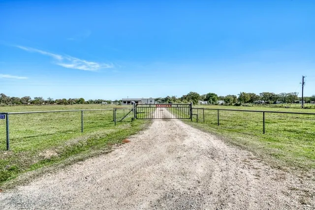 a view of a house with a swimming pool