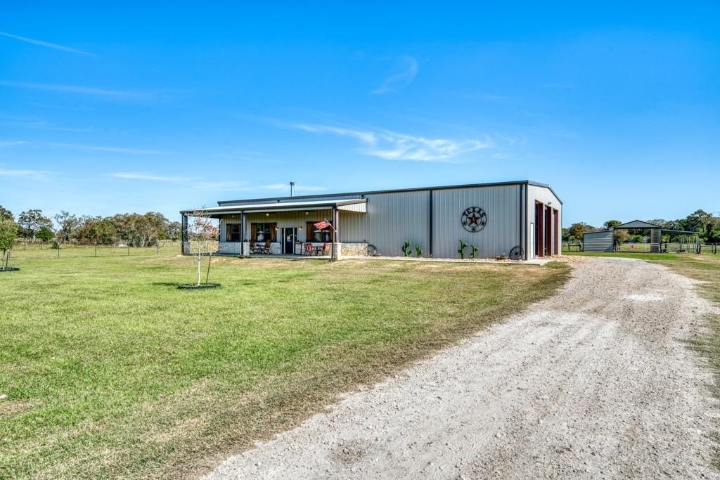 22273 Chapman Road Hempstead, TX 77445 - Photo 34 of 49 a view of house with outdoor space