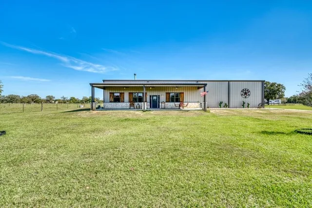 a view of a swimming pool and outdoor space