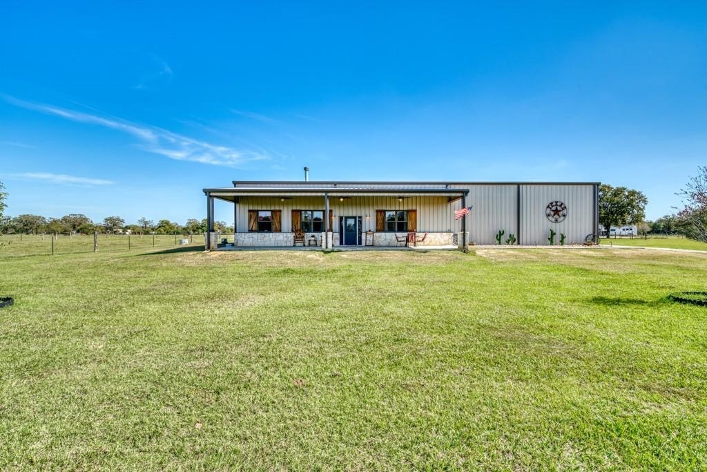 22273 Chapman Road Hempstead, TX 77445 - Photo 35 of 49 a view of a house with a big yard
