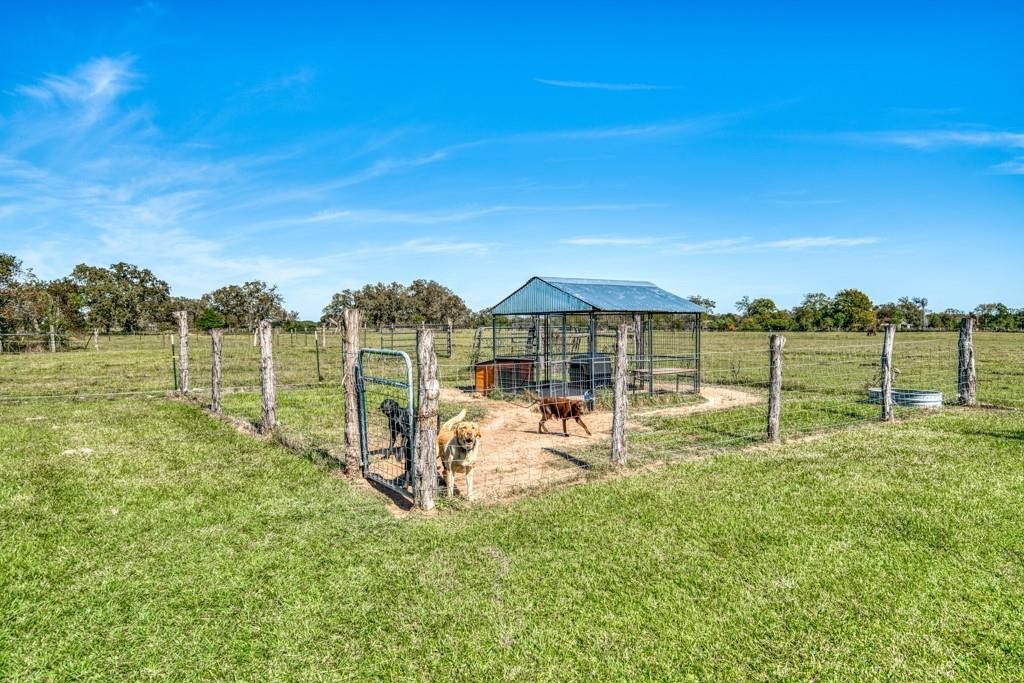 22273 Chapman Road Hempstead, TX 77445 - Photo 46 of 49 a view of a lake with a big yard