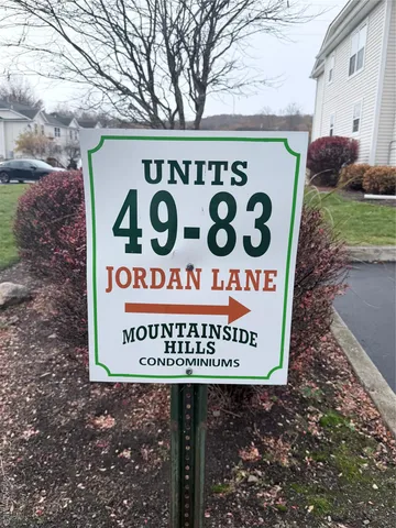 a sign on the side of a road