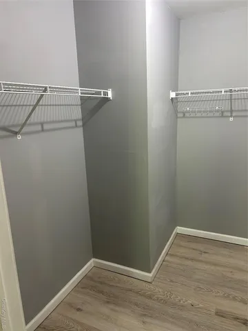 a view of a room with racks on the wall