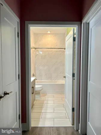 a bathroom with a vanity and a shower